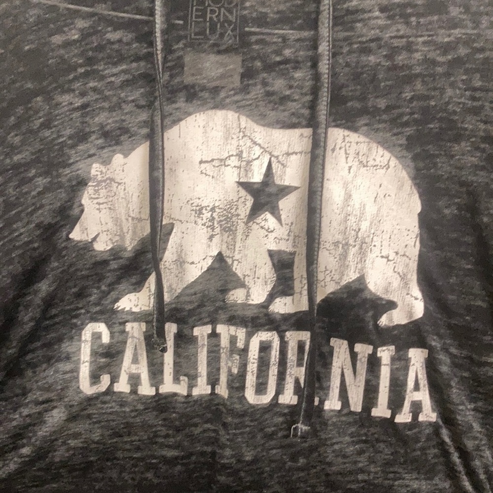 long sleeve with front pocket. Black and grey. Medium.